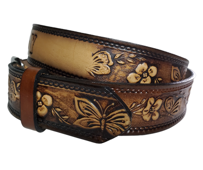 This stylish leather belt features beautiful flowers and butterfly artwork that is sure to draw attention. The easy-change metal buckle makes for comfortable wear and makes it easy to adjust for size. Perfect for adding a unique touch to any wardrobe. This belt is stocked in our shop outside Nashville in Smyrna, TN.