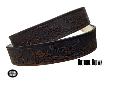 Full grain American vegetable tanned cowhide approx. 1/8"thick. Width 1 1/2" and includes Antique Nickle plated Solid Brass buckle Hand Finished in 3 color options Smooth burnished painted edges Choose with or without name, if without name, design will cover entire length of belt For name Type name desired on belt in "Type Name Here" section, no more than 8 letters maximum Buckle snaps in place for easy changing if desired Made in our Smyrna, TN, USA shop Belt Sizing Instructions