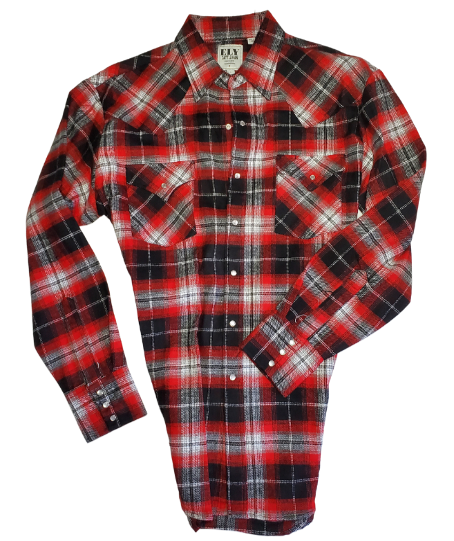 It doesn't get much anymore classic than a flannel shirt. This 100% cotton long sleeve flannel is complete with two front flap pockets, pearl snap details and yarn dyed flannel in the vintage plaid pattern. Great for hiking, working outdoors , riding horses or motorcycles. These never go out of style, always a in style! Available in our Smyrna, TN shop just outside Nashville. Imported