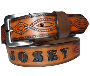"The Good, Bad, and the Ugly" is a professionally crafted, genuine leather belt made from 8-10 oz cowhide shoulder leather, approximately 1/8" thick. It boasts a hand burnished edge, Diamond center, and rope edge pattern, along with a multi-step dye and finishing technique. The antique nickel plated solid brass buckle is affixed with heavy snaps. This belt is crafted near Nashville, TN in Smyrna.