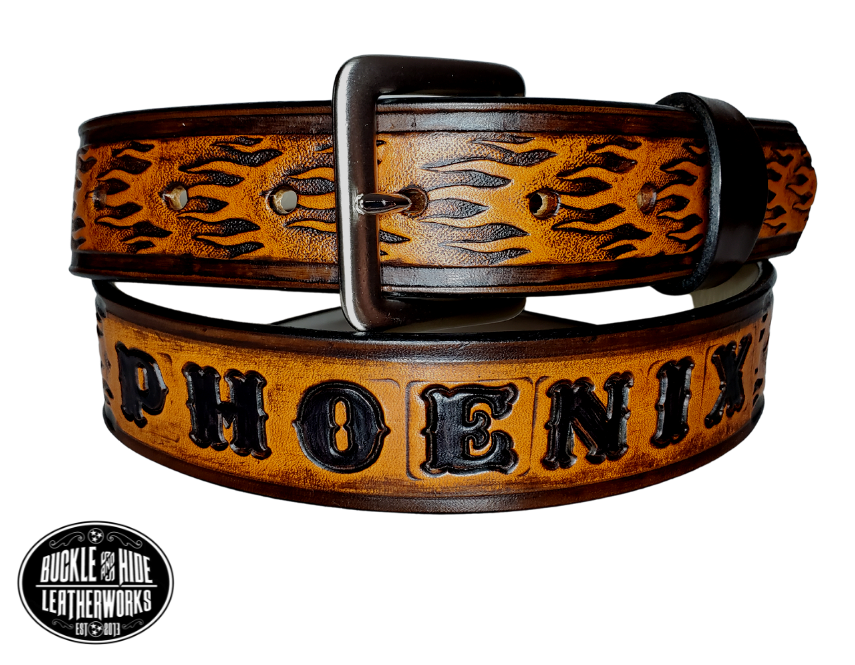 "The Blaze" is a handmade real leather belt made from a single strip of cowhide shoulder leather that is 8-10 oz. or approx. 1/8" thick. It has hand burnished (smoothed) edges and a FIRE/FLAME pattern. This belt is completely HAND dyed with a multi step finishing technic. The antique nickel plated solid brass buckle is snapped in place with heavy snaps.  This belt is made just outside Nashville in Smyrna, TN.