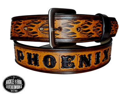 "The Blaze" is a handmade real leather belt made from a single strip of cowhide shoulder leather that is 8-10 oz. or approx. 1/8" thick. It has hand burnished (smoothed) edges and a FIRE/FLAME pattern. This belt is completely HAND dyed with a multi step finishing technic. The antique nickel plated solid brass buckle is snapped in place with heavy snaps.  This belt is made just outside Nashville in Smyrna, TN.