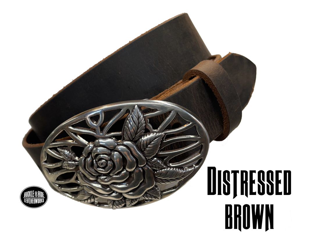 A Filigreed Rose design in Antique Nickel that looks great on plain 1 1/2" Black or Brown belt. Choose ONE belt strip color! A easy to wear oval shape that's not too big, measures approx. 3 7/8" wide by 2 1/2" tall. Belt is made from a single strip of leather in our shop in Smyrna, TN. Buckle is Imported. Available in our shop just outside Nashville in Smyrna, TN as well as online. Distressed brown belt.