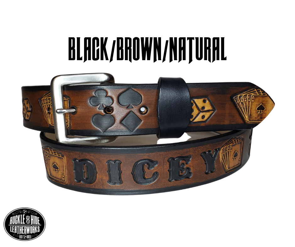 "The Gambler" is a handmade real leather belt made from a single strip of cowhide shoulder leather that is 8-10 oz. or approx. 1/8" thick. It has hand burnished (smoothed) edges and Aces, Eights, Dice, Clubs, Diamonds, Spade pattern down the center. This belt is completely HAND dyed with a multi step finishing technic. The antique nickel plated solid brass buckle is snapped in place with heavy snaps.  This belt is made just outside Nashville in Smyrna, TN.