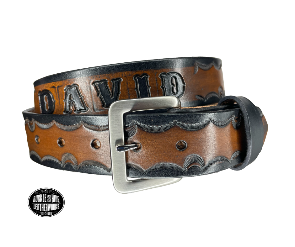 The Galinburg handmade all leather belt is made from a single strip of Veg-Tan cowhide or drum dyed (colored all the way through) Black cowhide shoulder leather.  The Black/Choc brown is a hand finished Veg-tan that is 9-10 oz., or approx. 1/8" thick.  The width is 1 1/2".  The antique nickel plated solid brass buckle is snapped in place. This belt is made just outside Nashville in Smyrna, TN. Perfect for casual and dress wear, it can be for personal use or for groomsman gifts or other gifts as 