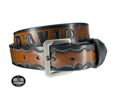 The Galinburg handmade all leather belt is made from a single strip of Veg-Tan cowhide or drum dyed (colored all the way through) Black cowhide shoulder leather.  The Black/Choc brown is a hand finished Veg-tan that is 9-10 oz., or approx. 1/8" thick.  The width is 1 1/2".  The antique nickel plated solid brass buckle is snapped in place. This belt is made just outside Nashville in Smyrna, TN. Perfect for casual and dress wear, it can be for personal use or for groomsman gifts or other gifts as 