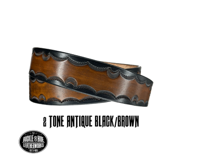 The Galinburg handmade all leather belt is made from a single strip of Veg-Tan cowhide or drum dyed (colored all the way through) Black cowhide shoulder leather.  The Black/Choc brown is a hand finished Veg-tan that is 9-10 oz., or approx. 1/8" thick.  The width is 1 1/2".    The antique nickel plated solid brass buckle is snapped in place. This belt is made just outside Nashville in Smyrna, TN. Perfect for casual and dress wear, it can be for personal use or for groomsman gifts or other gifts as 