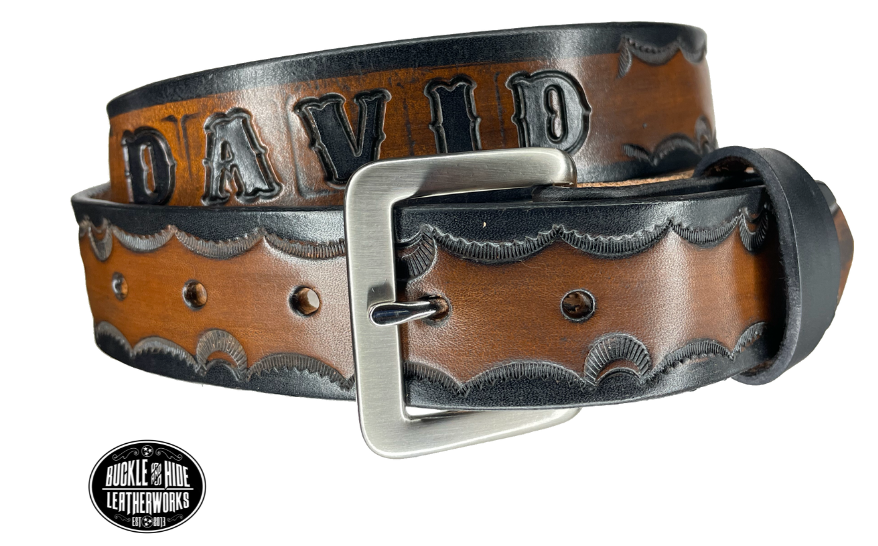 The Gatlinburg handmade all leather belt is made from a single strip of Veg-Tan cowhide or drum dyed (colored all the way through) Black cowhide shoulder leather.  The Black/Choc brown is a hand finished Veg-tan that is 9-10 oz., or approx. 1/8" thick.  The width is 1 1/2".  The antique nickel plated solid brass buckle is snapped in place. This belt is made just outside Nashville in Smyrna, TN. Perfect for casual and dress wear, it can be for personal use or for groomsman gifts or other gifts as 