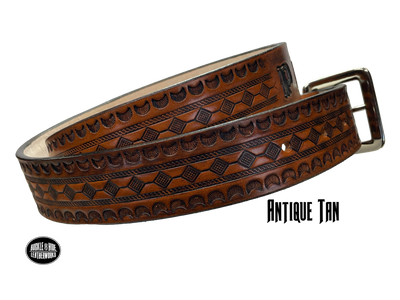 Full grain American vegetable tanned cowhide approx. 1/8"thick. Width 1 1/2" and includes Antique Nickle plated Solid Brass buckle Hand Finished in 3 color options Smooth burnished painted edges Choose with or without name, if without name, design will cover entire length of belt For name Type name desired on belt in "Type Name Here" section, no more than 8 letters maximum Buckle snaps in place for easy changing if desired Made in our Smyrna, TN, USA shop