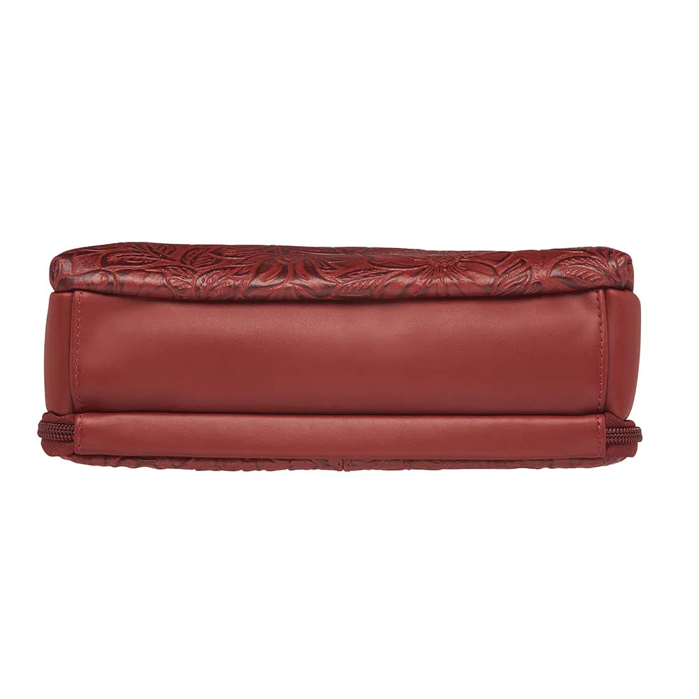 Tooled American Cowhide Clutch W/Carry Conceal Compartment. Designed for either Left or Right handed use, CCW special outside back compartment zips open on 3 sides, Special padding to prevent imprinting, Adjust holster to your comfort draw angle, Choose Black, Tan or Cherry. These are typically in-stock in our retail store in Smyrna, TN. not far from Nashville. Call for current stock.