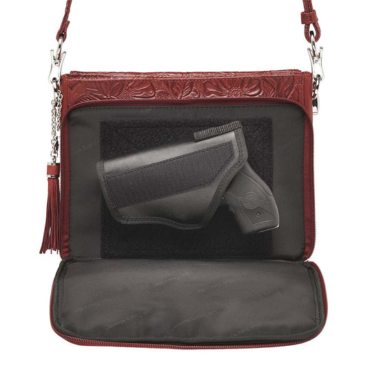Tooled American Cowhide Clutch W/Carry Conceal Compartment. Designed for either Left or Right handed use, CCW special outside back compartment zips open on 3 sides, Special padding to prevent imprinting, Adjust holster to your comfort draw angle, Choose Black, Tan or Cherry. These are typically in-stock in our retail store in Smyrna, TN. not far from Nashville. Call for current stock.