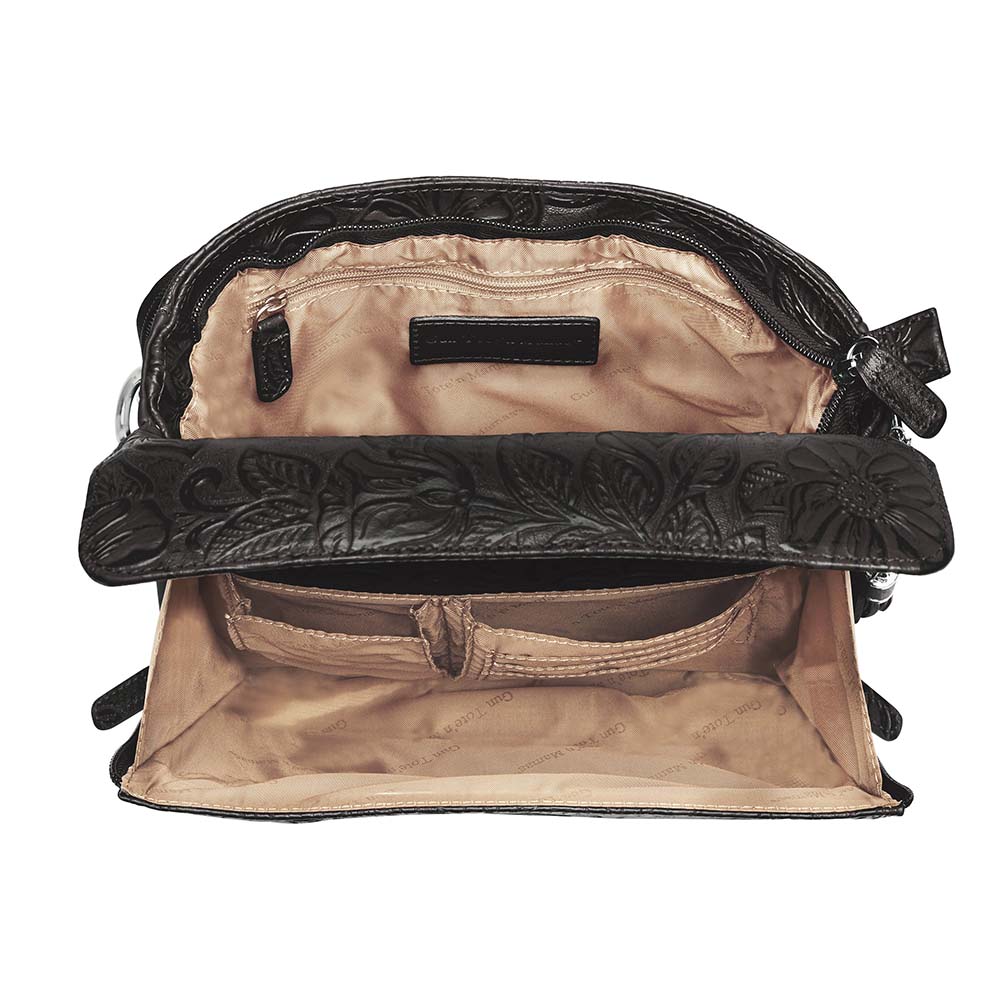 Tooled American Cowhide Clutch W/Carry Conceal Compartment. Designed for either Left or Right handed use, CCW special outside back compartment zips open on 3 sides, Special padding to prevent imprinting, Adjust holster to your comfort draw angle, Choose Black, Tan or Cherry. These are typically in-stock in our retail store in Smyrna, TN. not far from Nashville. Call for current stock.