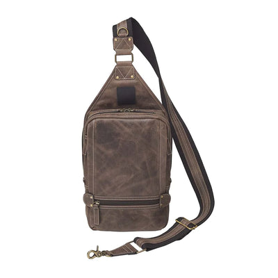 GTM Gun Compartment size: 7 – ¾” Wide x 10” Tall. Zipper opening: 8-1/2” – 9”Gun Footprint in holster: 7” Tall x 6-1/2” Wide. Antiqued Brass color hardware. Color: Distressed Brown   Slim Shape for ease of movement. Swings EASILY from back to front in seconds. Excellent for Wheelchair user.   Outsider front 3 separate zip pockets. Top zippered Main compartment2 inside extra pockets1 RFID protected zip pocket. IPAD easily fits