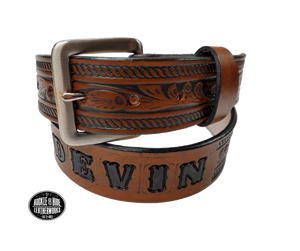 Be the star of the show with our "High Noon" Western Name Veg tan Leather Belt! Made with Veg tan cowhide in our Smyrna TN  shop just 20 miles outside of Nashville. It's designed for comfort and durability. Add a personalized name and change the buckle any time, all in 1 1/2" width of classic western style! Saddle up and get yours today!