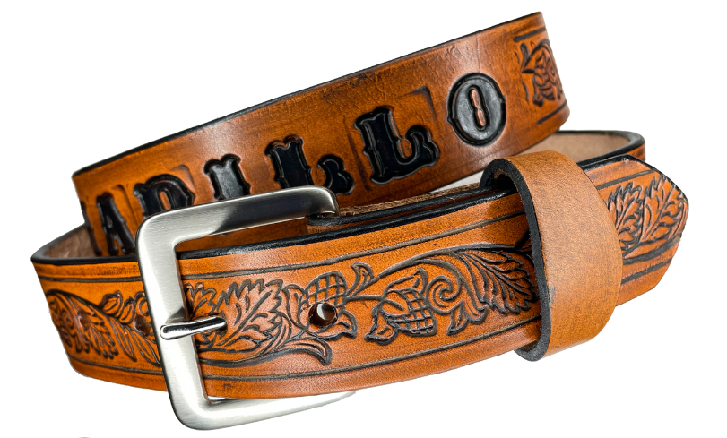 This solid strip of Veg Tan cowhide, is hand stained in 3 brown options, with smooth, finished edges. Embossed with Western Vine down length of belt, or have name added to scene up to 8 letters. Belt thickness is approx. 1/8", and 1 1/2" wide. Sizes available are 34" to 44" from buckle end to hole most worn. Attached with 2 snaps is a Brushed Nickel plated solid brass buckle. 