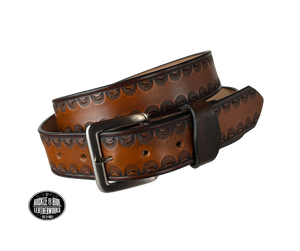 "The Jackson" handmade all leather belt is made from a single strip of Veg-tan cowhide or drum dyed (colored all the way through) Black cowhide shoulder leather.  The Two tone brown is a hand finished Veg-tan that is 9-10 oz., or approx. 1/8" thick.  The width is 1 1/2".   The antique nickel plated solid brass buckle is snapped in place. This belt is made just outside Nashville in Smyrna, TN. Perfect for casual and dress wear, it can be for personal use or for groomsman gifts or other gifts as well. 