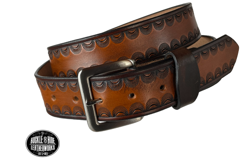 "The Jackson" handmade all leather belt is made from a single strip of Veg-tan cowhide or drum dyed (colored all the way through) Black cowhide shoulder leather.  The Two tone brown is a hand finished Veg-tan that is 9-10 oz., or approx. 1/8" thick.  The width is 1 1/2".   The antique nickel plated solid brass buckle is snapped in place. This belt is made just outside Nashville in Smyrna, TN. Perfect for casual and dress wear, it can be for personal use or for groomsman gifts or other gifts as well. 