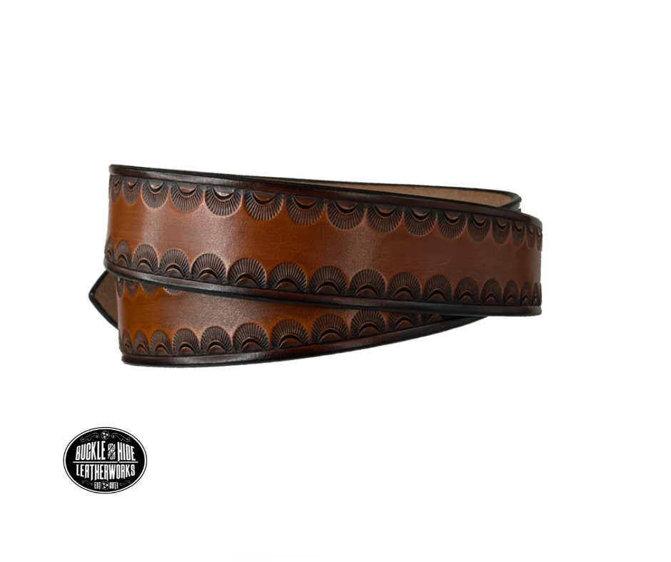 "The Jackson" handmade all leather belt is made from a single strip of Veg-tan cowhide or drum dyed (colored all the way through) Black cowhide shoulder leather.  The Two tone brown is a hand finished Veg-tan that is 9-10 oz., or approx. 1/8" thick.  The width is 1 1/2".   The antique nickel plated solid brass buckle is snapped in place. This belt is made just outside Nashville in Smyrna, TN. Perfect for casual and dress wear, it can be for personal use or for groomsman gifts or other gifts as well. 