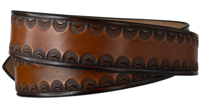 "The Jackson" handmade all leather belt is made from a single strip of Veg-tan cowhide or drum dyed (colored all the way through) Black cowhide shoulder leather.  The Two tone brown is a hand finished Veg-tan that is 9-10 oz., or approx. 1/8" thick.  The width is 1 1/2".   The antique nickel plated solid brass buckle is snapped in place. This belt is made just outside Nashville in Smyrna, TN. Perfect for casual and dress wear, it can be for personal use or for groomsman gifts or other gifts as well. 