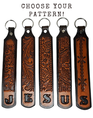 Our Customizable "1975" Longer Leather keychain embossed similar to our popular belts.  Great for identifying luggage, backpacks, or your keys! Available in the below choices All colored in our popular 2 TONE BROWN, pick one or a few. Made in our Smyrna, TN shop. Please type desired name in CUSTOM box.   Measures...approx. 1" x 7"