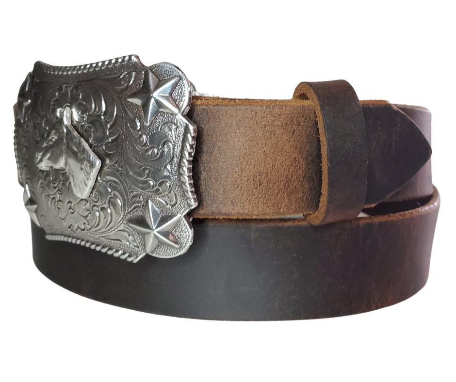 Our Kids/Youth Belt Combo is a great choice who's wants to be like dad or mom! Belt leather that is approx. 1/8"thick. The width is 1 1/4" and this Combo includes a 2" x 2 1/2" sized Western styled Nickle plated Rectangle shaped buckle with a Horsehead framed with Stars completed with a rope edge. Buckle snaps in place for easy changing if desired. Choose a Black or Distressed Brown Leather belt for the Combo. Made in our Smyrna, TN, USA shop. NO names on this belt.           