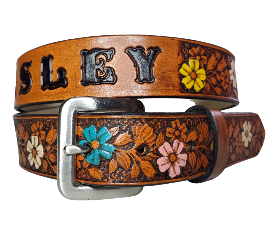 Our "Lil Beulah' is just like the Beulah Land for mom with HAND PAINTED FLOWERS. Full grain American vegetable tanned cowhide approx. 1/8"thick. Width is 1 1/4" and includes Antique Nickle plated Solid Brass buckle. We Hand Finish with a tan center. Edges are smooth burnished painted edges. Made in our Smyrna, TN, USA shop. Buckle snaps in place for easy changing if desired.