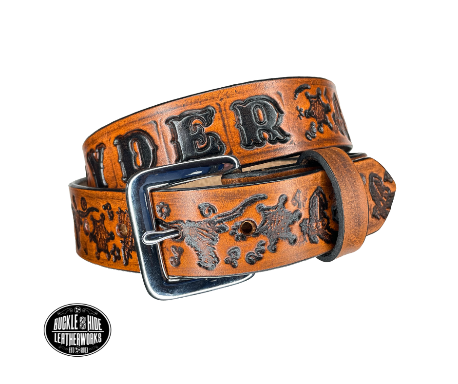 Full grain American vegetable tanned cowhide approx. 1/8"thick. Width 1 1/4" and includes Antique Nickle plated Solid Brass buckle Hand Finished Smooth burnished painted edges Choose with or without name, if without name, design will cover entire length of belt For name Type name desired on belt in "Type Name Here" section, no more than 8 letters maximum Buckle snaps in place for easy changing if desired Made in our Smyrna, TN, USA shop.