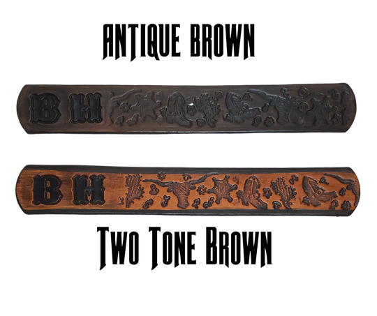 Full grain American vegetable tanned cowhide approx. 1/8"thick. Width 1 1/4" and includes Antique Nickle plated Solid Brass buckle Hand Finished Smooth burnished painted edges Choose with or without name, if without name, design will cover entire length of belt For name Type name desired on belt in "Type Name Here" section, no more than 8 letters maximum Buckle snaps in place for easy changing if desired Made in our Smyrna, TN, USA shop.