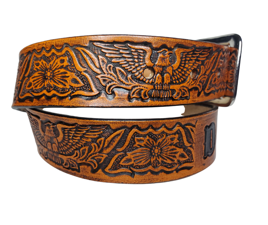 Our "Patriot" is just like the Patriot' for dad or mom. Full grain American vegetable tanned cowhide approx. 1/8"thick. Width is 1 1/4" and includes Antique Nickle plated Solid Brass buckle. We Hand Finish with each belt. Edges are smooth burnished painted edges. Made in our Smyrna, TN, USA shop. Buckle snaps in place for easy changing if desired.  Choose with or without name, if without name, 