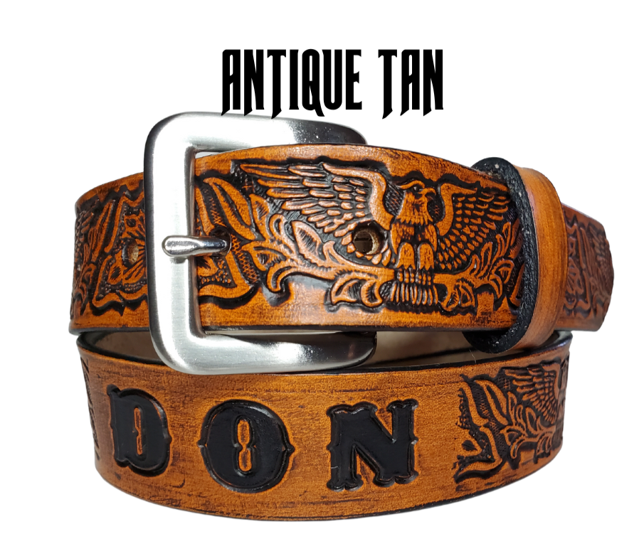 Our "Patriot" is just like the Patriot' for dad or mom. Full grain American vegetable tanned cowhide approx. 1/8"thick. Width is 1 1/4" and includes Antique Nickle plated Solid Brass buckle. We Hand Finish with each belt. Edges are smooth burnished painted edges. Made in our Smyrna, TN, USA shop. Buckle snaps in place for easy changing if desired.  Choose with or without name, if without name 