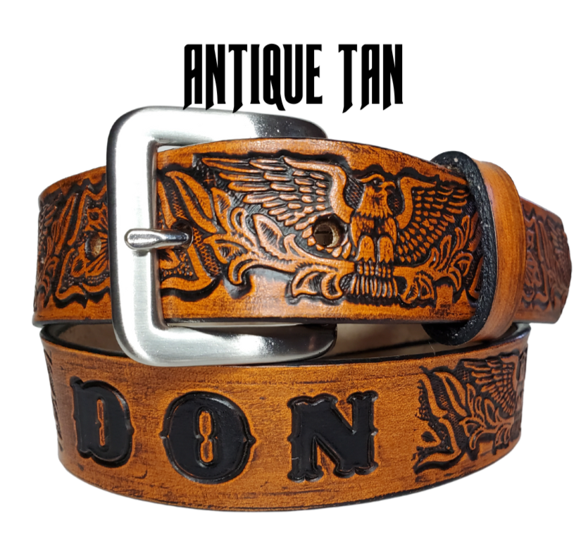 Our "Patriot" is just like the Patriot' for dad or mom. Full grain American vegetable tanned cowhide approx. 1/8"thick. Width is 1 1/4" and includes Antique Nickle plated Solid Brass buckle. We Hand Finish with each belt. Edges are smooth burnished painted edges. Made in our Smyrna, TN, USA shop. Buckle snaps in place for easy changing if desired.  Choose with or without name, if without name, 