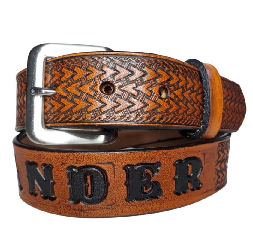 Our "Kid's Wayfarer" is just like the Wayfarer' for dad or mom. Full grain American vegetable tanned cowhide approx. 1/8"thick. Width is 1 1/4" and includes Antique Nickle plated Solid Brass buckle. We Hand Finish with each belt. Edges are smooth burnished painted edges. Made in our Smyrna, TN, USA shop. Buckle snaps in place for easy changing if desired.  Choose with or without name