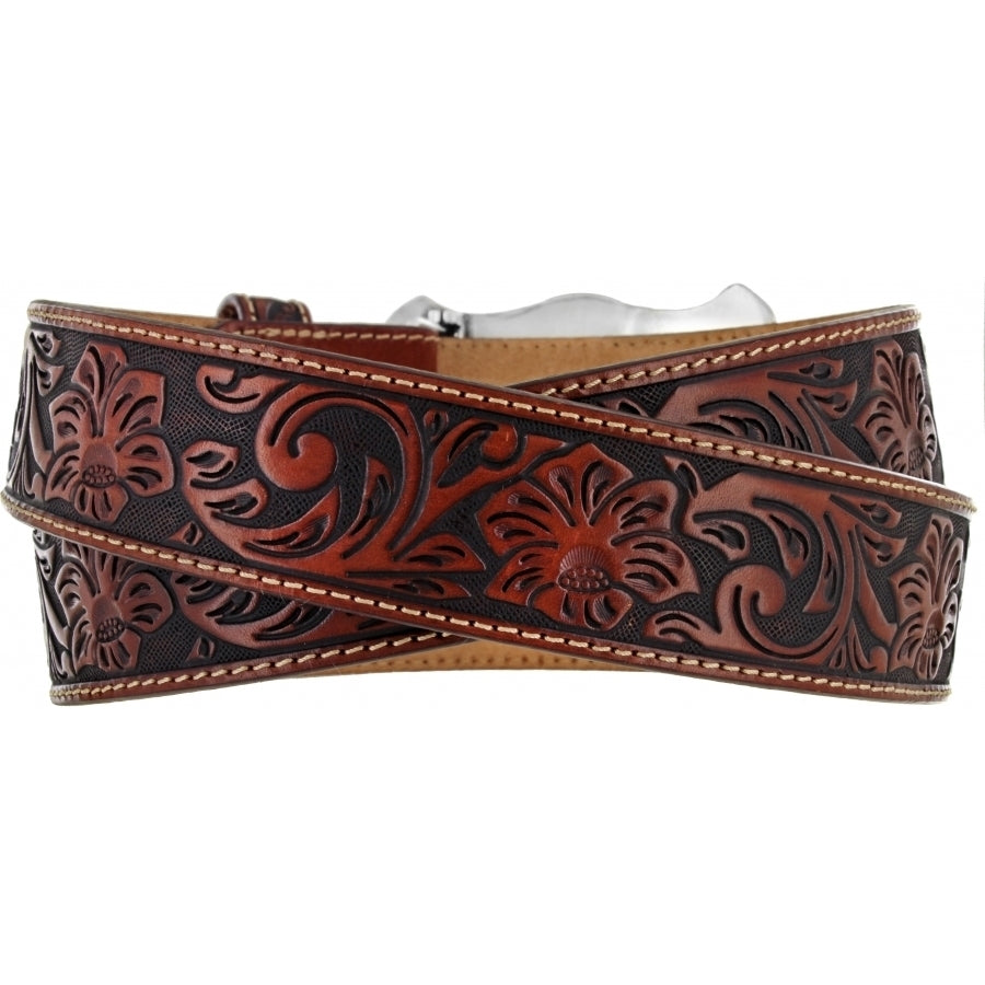 How the west was won isn't the question - it's how it's worn that matters. This tooled belt with iconic motifs and buckle leads the westward looks. Includes matching Leather buckle that can be changed with unsnapping. Belt is 1 1/2" wide in a two toned mahogany brown with contrasted white stitching along edges of the belt. Made in USA by Brighton for Justin. Available at our Smyrna, TN shop.     