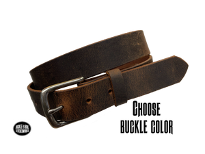 This is a full grain, solid leather, brown Water Buffalo belt with a distressed look and beveled smooth edges. The strap is 1 1/4" wide, approximately 1/8" thick, in sizes from 34" to 44" from buckle end to hole most worn. You may choose the buckle with either an antique brass finish or an antique silver finish. The buckle is held in place with 2 snaps for easy buckle change. Great for everyday wear or casual office dress. Handmade in our Smyrna, TN shop, just outside Nashville.