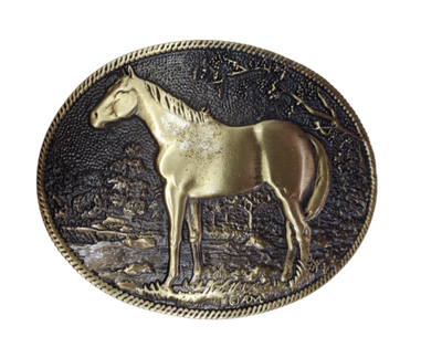 This is the buckle for Horse lovers everywhere. Antiqued brass colored Standing Horse Attitude buckle.  Standard 1.5 belt swivel Available at our shop just outside Nashville in Smyrna, TN. Dimensions: Width 4.00" Height 3.25" Length 0.80"