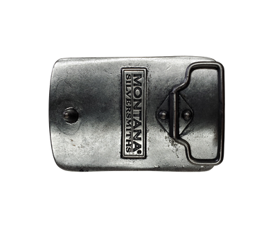 A deeply antiqued silver tone rectangular Attitude buckle with an overall flag design but instead of stars and stripes there are bullet holes and bullets. Standard 1.5 inch belt swivel. Available online and at our shop just outside Nashville in Smyrna, TN. Dimensions: Width 3.75" Height 2.50" Length 0.70"