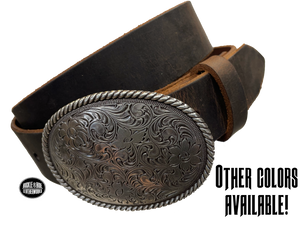 This oval shaped buckle by Nocona has a rope design around the border. It is chrome colored with scroll design etched appearance on surface.  Measures 2 3/4" tall by 3 3/4" wide and fits belts up to 1 1/2" wide. Buckle is made in Taiwan. Belt is a solid strip of leather and made in our shop in Smyrna, TN, just outside Nashville. It is 1 1/2" wide and available in sizes 34"-44" and colors distressed brown, black, and dark brown. ﻿It is available for purchase in our retail shop and online store. Main photo.