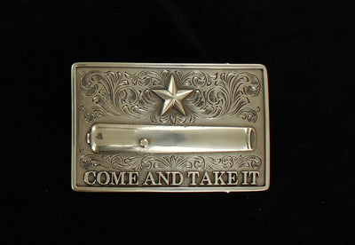 Come and Take It Belt Buckle, Nocona men's buckle features a smooth edge Rectangle shape with western scroll and star at the top and a cannon with the words "come and take it" on the bottom. Measures  2 1/8" tall by 3 3/8" wide Available online and in our retail shop in Smyrna, TN, just outside of Nashville