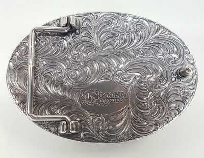 Oval shaped Nocona buckle Smooth edge and "Don't Tread On Me" motif Measures 2 1/2" tall by 3 1/2" wide Made in Taiwan Available online and in our shop in Smyrna, TN, just outside of Nashville. back of buckle