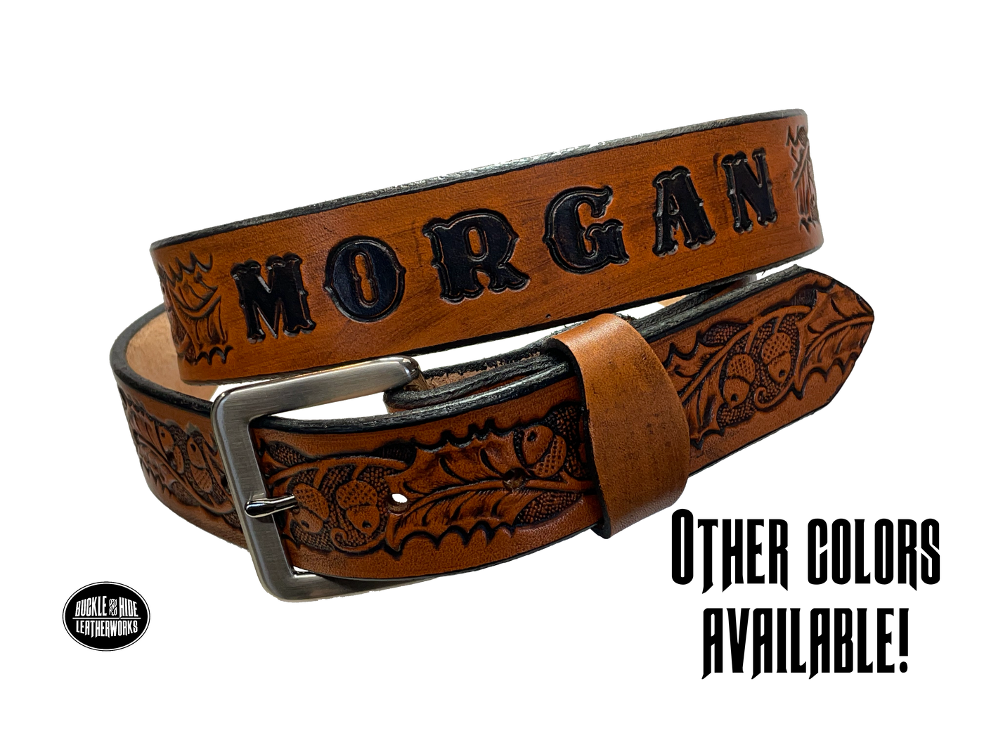 The Tall Oak Name Leather Belt is crafted from strong, high-quality Veg tan leather with an embossed Oak and Acorn pattern. Choose your finish and a name if desired. Its solid Antique nickel brass buckle is easy to change with included snaps, perfect for everyday wear. Handmade outside of Nashville in Smyrna, TN.