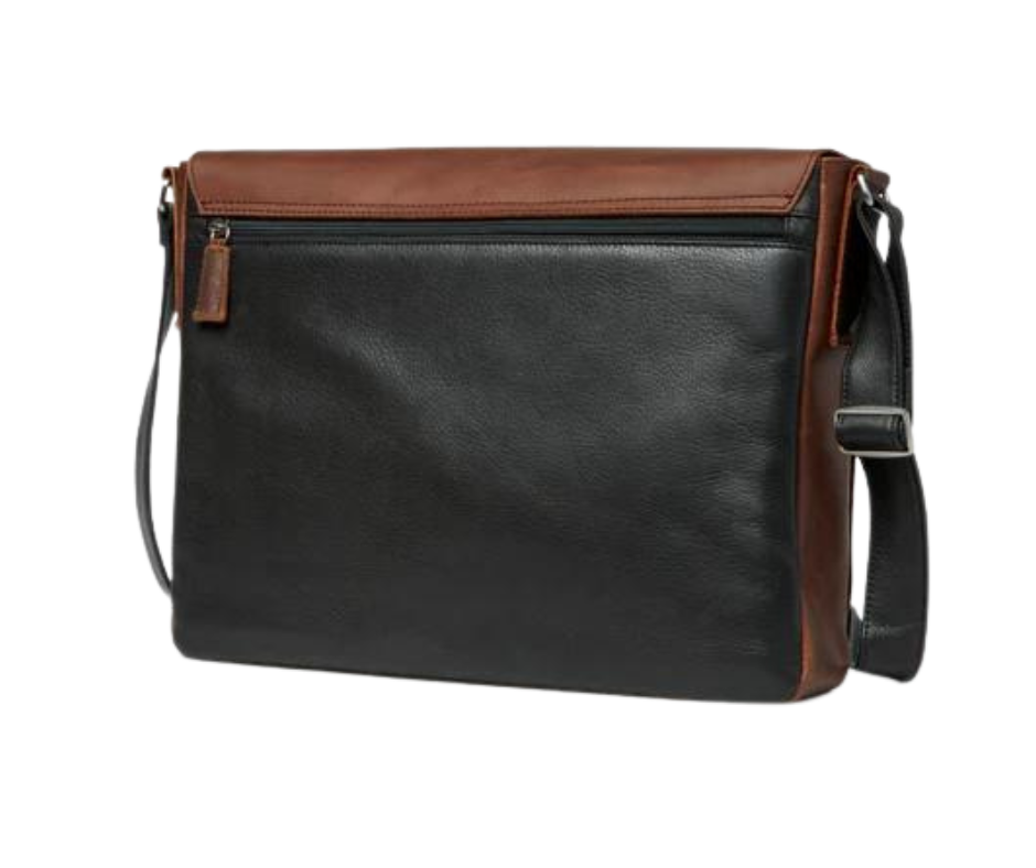 This leather messenger bag is made from soft real cowhide leather.  Flap is distressed brown leather and body has contrasting darker brown or black colored leather. The flap secures with a magnetic snap. Dimensions are approx. 15" by 12" by 3". Back pocket will hold a full size laptop.  Inner bag is lined with nylon and leather trim and hardware is brushed nickel. Available for purchase in our retail shop in Smyrna, TN, just outside Nashville.