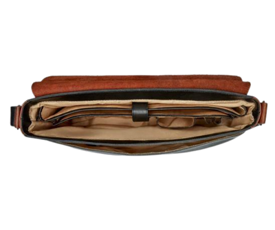 This leather messenger bag is made from soft real cowhide leather.  Flap is distressed brown leather and body has contrasting darker brown or black colored leather. The flap secures with a magnetic snap. Dimensions are approx. 15" by 12" by 3". Back pocket will hold a full size laptop.  Inner bag is lined with nylon and leather trim and hardware is brushed nickel. Available for purchase in our retail shop in Smyrna, TN, just outside Nashville.