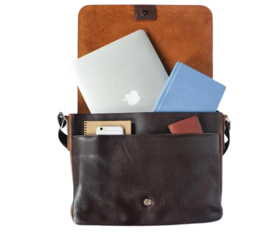 This 2 tone brown leather messenger bag is made from real cowhide leather.&nbsp; Flap is a smooth oil tanned leather with a distressed look and the body has contrasting soft pebbled grain leather. The flap secures with a magnetic snap. Dimensions are approx. 15" by 12" by 3". Back pocket will hold a full size laptop.&nbsp; Inner bag is lined with nylon and leather trim and hardware is brushed nickel. Available for purchase in our retail shop in Smyrna, TN, just outside Nashville.