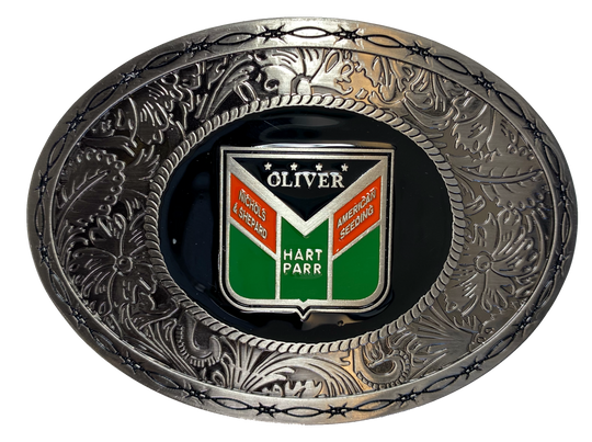 Western influenced oval buckle with barbed wire and western tooling and Oliver Tractor logo in the center. Available online and in our shop just outside Nashville in Smyrna, TN. Approx. 3"x4" in size.