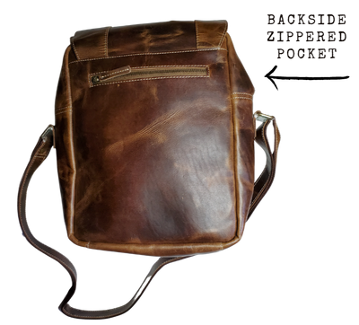 The Parker Crossbody/Messenger Bag is great for the busy person on the go. Pack your Tablet, notebooks, pens, a snack all in a distressed leather bag. Exterior & interior slip pockets. Adjustable strap allows this bag to be worn as convenient crossbody/messenger style.  Available also in our Smyrna ,TN shop just outside Nashville. Product made in India.