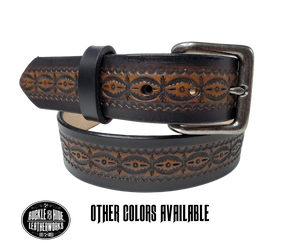 This handmade real leather belt is made from black, drum dyed cowhide shoulder that is 8-9 oz. or approx. 1/8" thick.  It is 1 1/2" wide and has a vintage design embossed on the surface with smoothed and burnished edges. The antique nickel plated solid brass buckle is snapped in place. Made just outside Nashville, in Smyrna, TN, you will find it is one of the longest lasting belts you will own.  It is made from a single strip of leather and is perfect for either casual or dress w