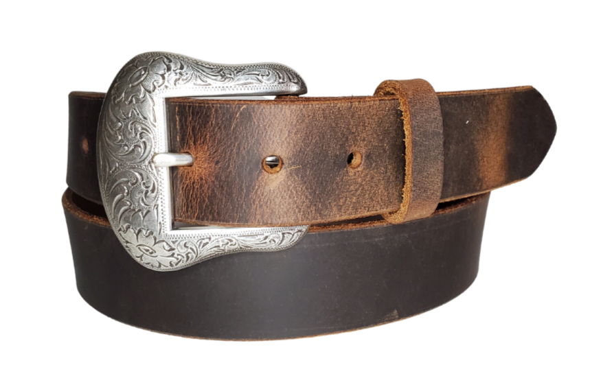 "The Sheridan" named after the well known town in Wyoming. The buckle has a Western Scroll pattern in a antique silver color that is right at home on the Ranch or Downtown, Belt is a solid strip of leather and made in our shop in Smyrna, TN, just outside of Nashville. Belt is 1 1/2" wide, choose from either distressed brown, black, or chocolate brown. Sizes available from 34"-44". Buckle is imported. Available in our retail and online shops.