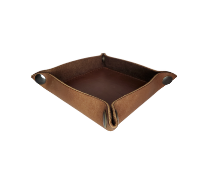 This handmade real leather valet tray has Antique Brass SNAPPED corners to FLATTEN out for easy packing for travel. It is made in our Smyrna, TN shop just outside Nashville.  The Stitched inside leather matches the outside for rustic look. It is a perfect catch-all for keeping keys and other small items in one place at the end of a long day.  Makes a great gift for groomsmen, or that special someone. ADD 3 initials, Available in 2 sizes. If you want 3 initials added, please type in CUSTOM box.