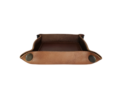 This handmade real leather valet tray has Antique Brass SNAPPED corners to FLATTEN out for easy packing for travel. It is made in our Smyrna, TN shop just outside Nashville.  The Stitched inside leather matches the outside for rustic look. It is a perfect catch-all for keeping keys and other small items in one place at the end of a long day.  Makes a great gift for groomsmen, or that special someone. ADD 3 initials, Available in 2 sizes. If you want 3 initials added, please type in CUSTOM box.