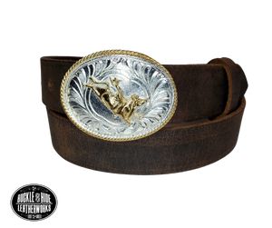 Our Kids/Youth Belt Combo is a great choice who's wants to be like dad or mom! Full grain Distressed Brown Water Buffalo or Black cowhide leather that is approx. 1/8"thick. The width is 1 1/4" and this Combo includes a 2" x 2 1/2" sized Western styled Nickle plated oval shaped buckle with a Flying Eagle completed with a rope edge. Buckle snaps in place for easy changing if desired. Choose a Black or Distressed Brown Leather belt for the Combo. Made in our Smyrna, TN, USA shop.  